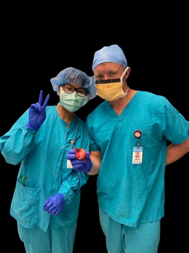 MedTech students posing with an excised hip joint